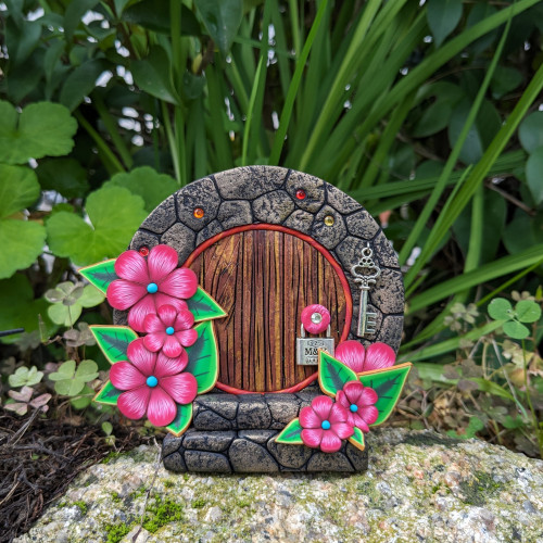 Hobbit door with maroon flowers