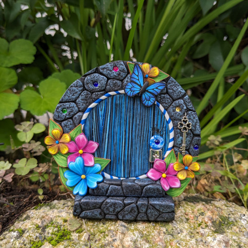 Round magic door with blue butterfly