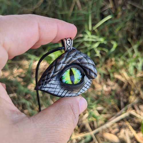 Dragon eye with green iris