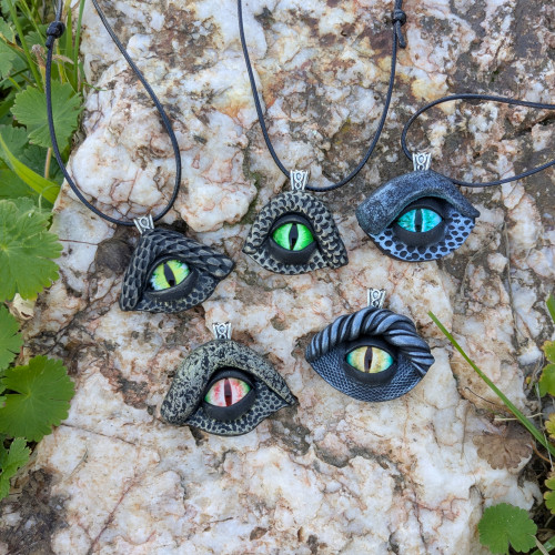 Dragon eye pendants in mixed tones