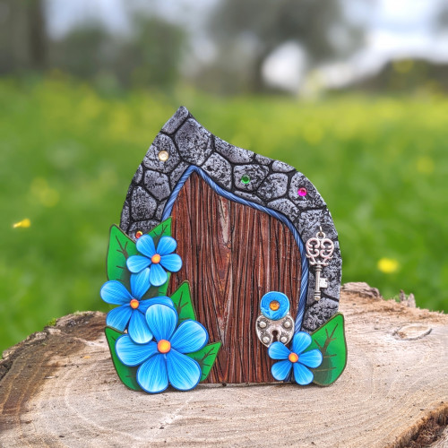 Puerta de Hadas con flores azules